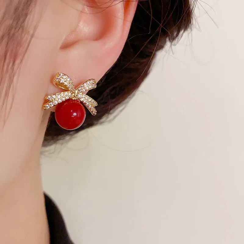 Sparkling Rhinestone Bow Pearl Stud Earrings